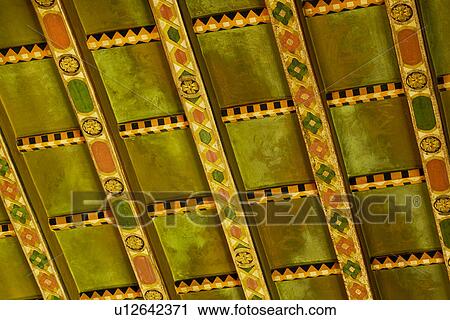 Stock Image - Detail hand painted ceiling beams. Fotosearch