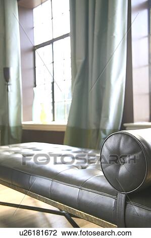 Stock Image - Detail leather chaise lounge. Fotosearch