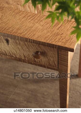 Stock Image - Detail wooden end table. Fotosearch