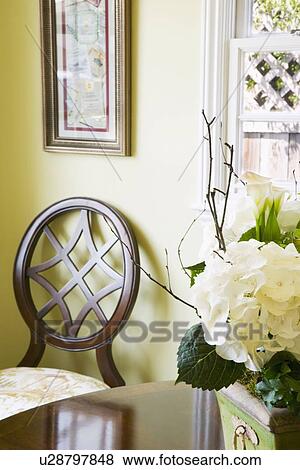 Dining chair against wall View Large Photo Image Stock Photo - Dining chair against wall. Fotosearch
