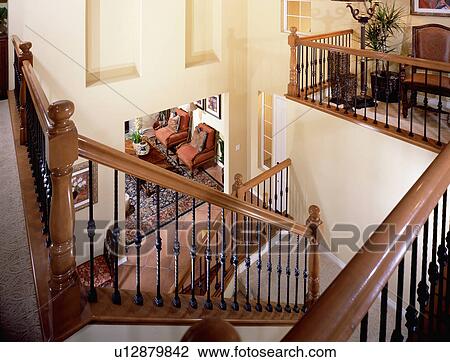 High angle u shaped staircase with railing View Large Photo Image Stock Image - High angle u shaped staircase with railing. Fotosearch