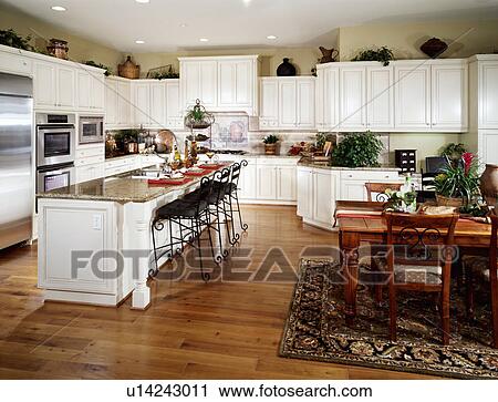 Large contemporary kitchen with breakfast bar View Large Photo Image Stock Image - Large contemporary kitchen with breakfast bar. Fotosearch