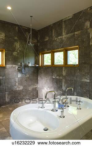 Modern double bathroom sink in spacious bathroom View Large Photo Image Stock Photo - Modern double bathroom sink in spacious bathroom. Fotosearch