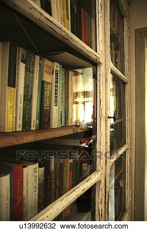 Old cabinet full of books View Large Photo Image Stock Image - Old cabinet full of books. Fotosearch