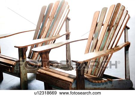 Pair of wooden Adirondack chairs View Large Photo Image Stock Photo - Pair of wooden Adirondack chairs. Fotosearch