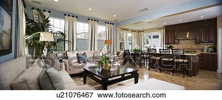 Stock Photo - Panoramic of contemporary living room and kitchen. Fotosearch
