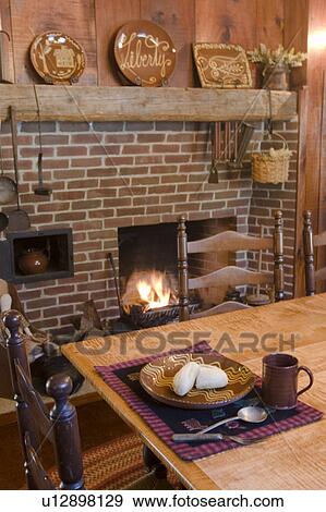 Place setting in colonial style dining room View Large Photo Image Stock Photo - Place setting in colonial style dining room. Fotosearch