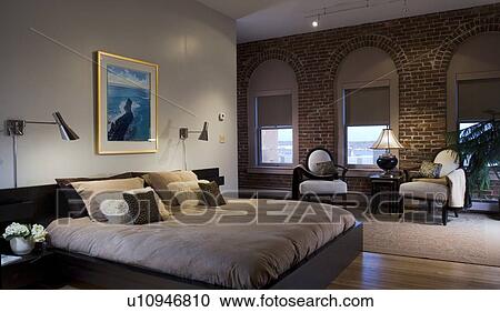 Platform bed in modern bedroom View Large Photo Image Stock Image - Platform bed in modern bedroom. Fotosearch
