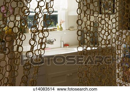 Picture - Selective focus ring curtain outside of kitchen. Fotosearch