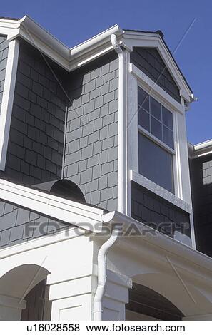 Stock Photo - Shingled dormer on contemporary home. Fotosearch