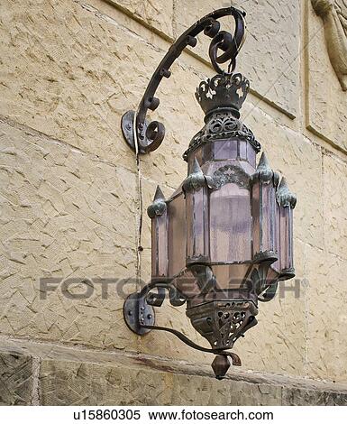 Spanish style lantern exterior light View Large Photo Image Stock Photography - Spanish style lantern exterior light. Fotosearch