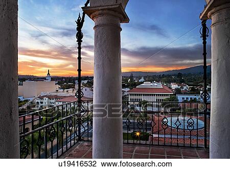 Stock Image - Sunset view from balcony overlooking Santa Barbara. Fotosearch