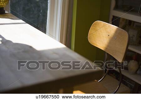 Top Of Old Fashioned Desk Chair Near Table Stock Image U19667550