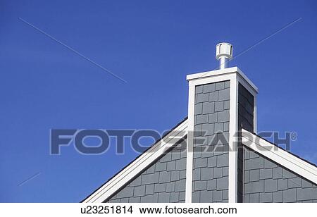 Top of shingle style home with air vent View Large Photo Image Picture - Top of shingle style home with air vent. Fotosearch