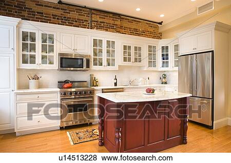 Stock Photo - Traditional kitchen with red island. Fotosearch