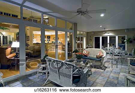 Wicker furniture on patio outside home View Large Photo Image Stock Photograph - Wicker furniture on patio outside home. Fotosearch