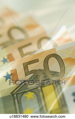 Stock Image - 50 euro notes spread out. Fotosearch