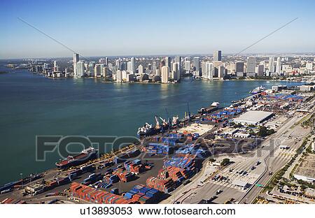 Aerial view of waterfront city and port View Large Photo Image Stock Image - Aerial view of waterfront city and port. Fotosearch