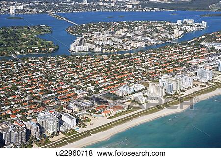 Aerial view of waterfront city View Large Photo Image Stock Photo - Aerial view of waterfront city. Fotosearch