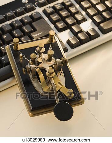 Stock Photo - Antique telegraph key and keyboard. Fotosearch