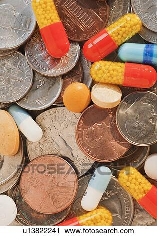 Assorted coins and bills in change purse View Large Photo Image Stock Image - Assorted coins and bills in change purse. Fotosearch