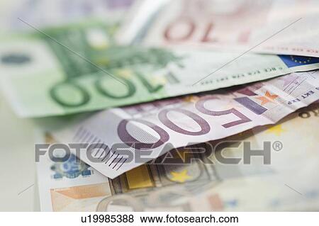 Assorted euro notes and coins View Large Photo Image Stock Photo - Assorted euro notes and coins. Fotosearch