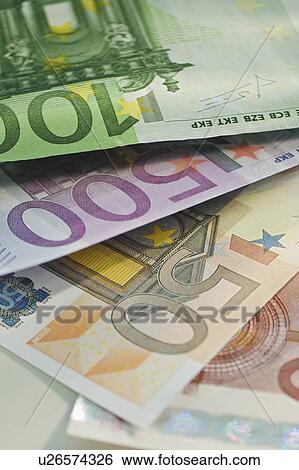 Stock Photograph - Assorted euro notes and coins. Fotosearch