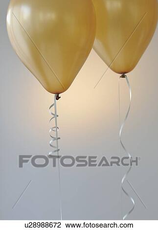 Stock Image - Balloons and ribbons. Fotosearch