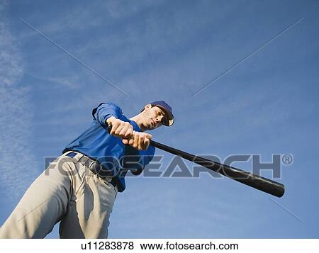 Baseball player swinging bat View Large Photo Image Stock Photo - Baseball player swinging bat. Fotosearch