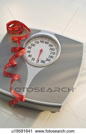 Bathroom scale and tape measure View Large Photo Image Stock Image - Bathroom scale and tape measure. Fotosearch