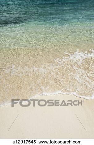 Beach and clear ocean water View Large Photo Image Stock Photography - Beach and clear ocean water. Fotosearch