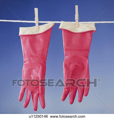 Stock Photograph - Bibs drying on clothesline. Fotosearch