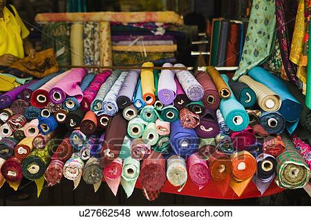 Bolts of colorful fabric View Large Photo Image Stock Photo - Bolts of colorful fabric. Fotosearch