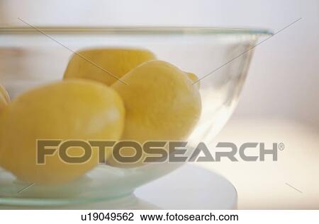 Stock Image - Bowl of lemons. Fotosearch