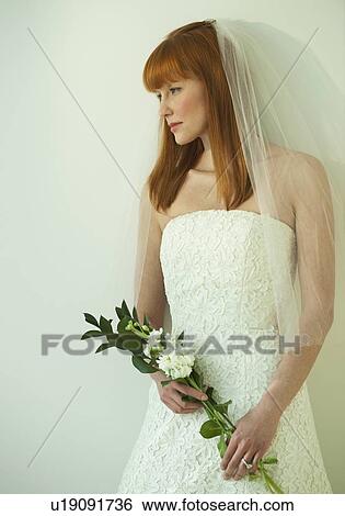 Bride in wedding dress View Large Photo Image Stock Photograph - Bride in wedding dress. Fotosearch