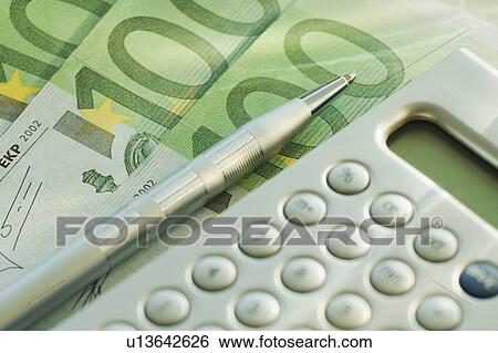 Calculator and 100 euro notes View Large Photo Image Stock Photograph - Calculator and 100 euro notes. Fotosearch