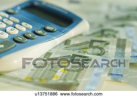 Calculator and 5 euro notes View Large Photo Image Stock Photograph - Calculator and 5 euro notes. Fotosearch