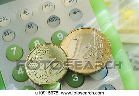 Calculator and euro coins View Large Photo Image Stock Photography - Calculator and euro coins. Fotosearch