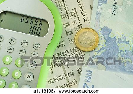 Stock Photo - Calculator and euros. Fotosearch