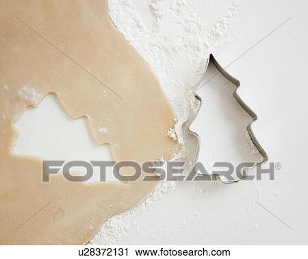 Christmas cookie cutter and dough View Large Photo Image Stock Image - Christmas cookie cutter and dough. Fotosearch