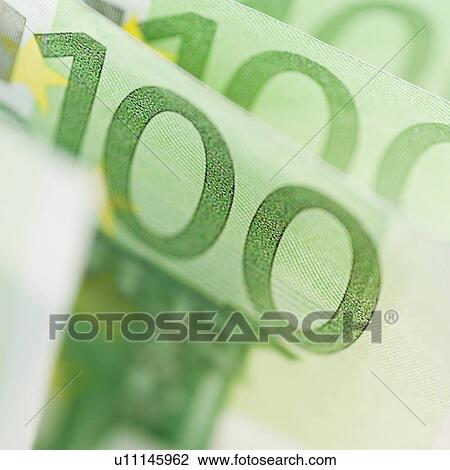 Stock Image - Close up of 100 euro notes. Fotosearch