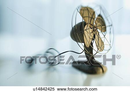 Stock Photography - Close up of antique fan. Fotosearch