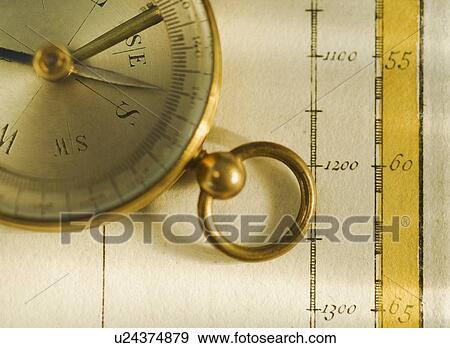 Close up of antique map and compass View Large Photo Image Stock Photo - Close up of antique map and compass. Fotosearch