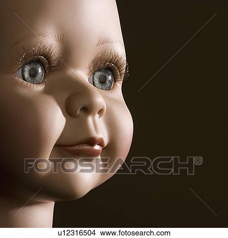Close up of baby doll face View Large Photo Image Picture - Close up of baby doll face. Fotosearch