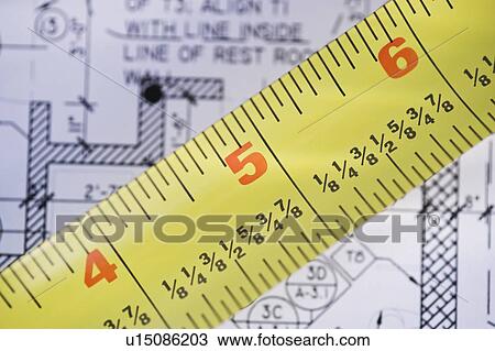 Close up of blueprint and tape measure View Large Photo Image Stock Image - Close up of blueprint and tape measure. Fotosearch