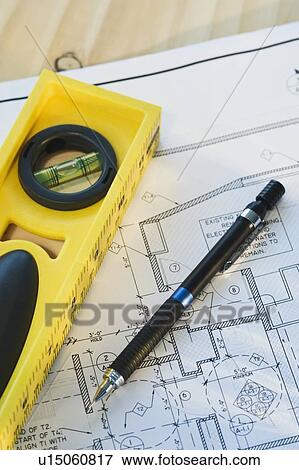 Close up of blueprint and tools View Large Photo Image Stock Photo - Close up of blueprint and tools. Fotosearch