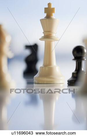 Close up of chess pieces View Large Photo Image Stock Image - Close up of chess pieces. Fotosearch