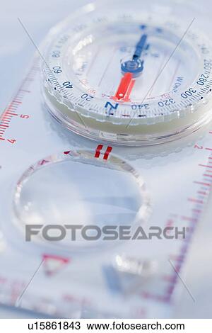 Stock Image - Close up of compass. Fotosearch