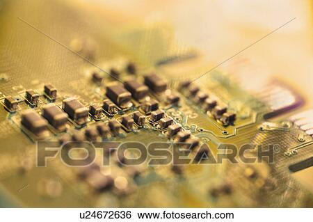 Stock Photograph - Close up of computer circuit board. Fotosearch