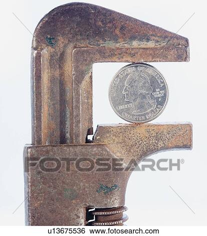 Stock Photograph - Close up of dollar bills and American flag. Fotosearch